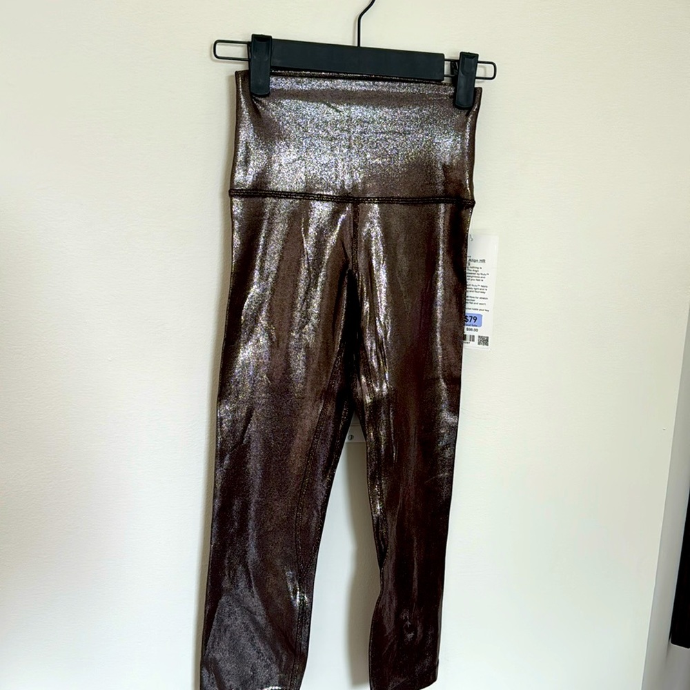 New with tags Lululemon shine align, high-rise, crop 21 inch size 2